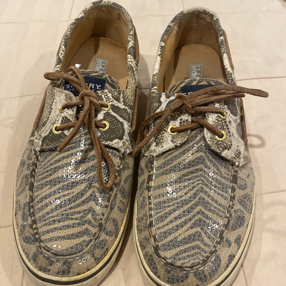 Women’s size 12 Sperry Top-sister slip on shoes .  Animal print design